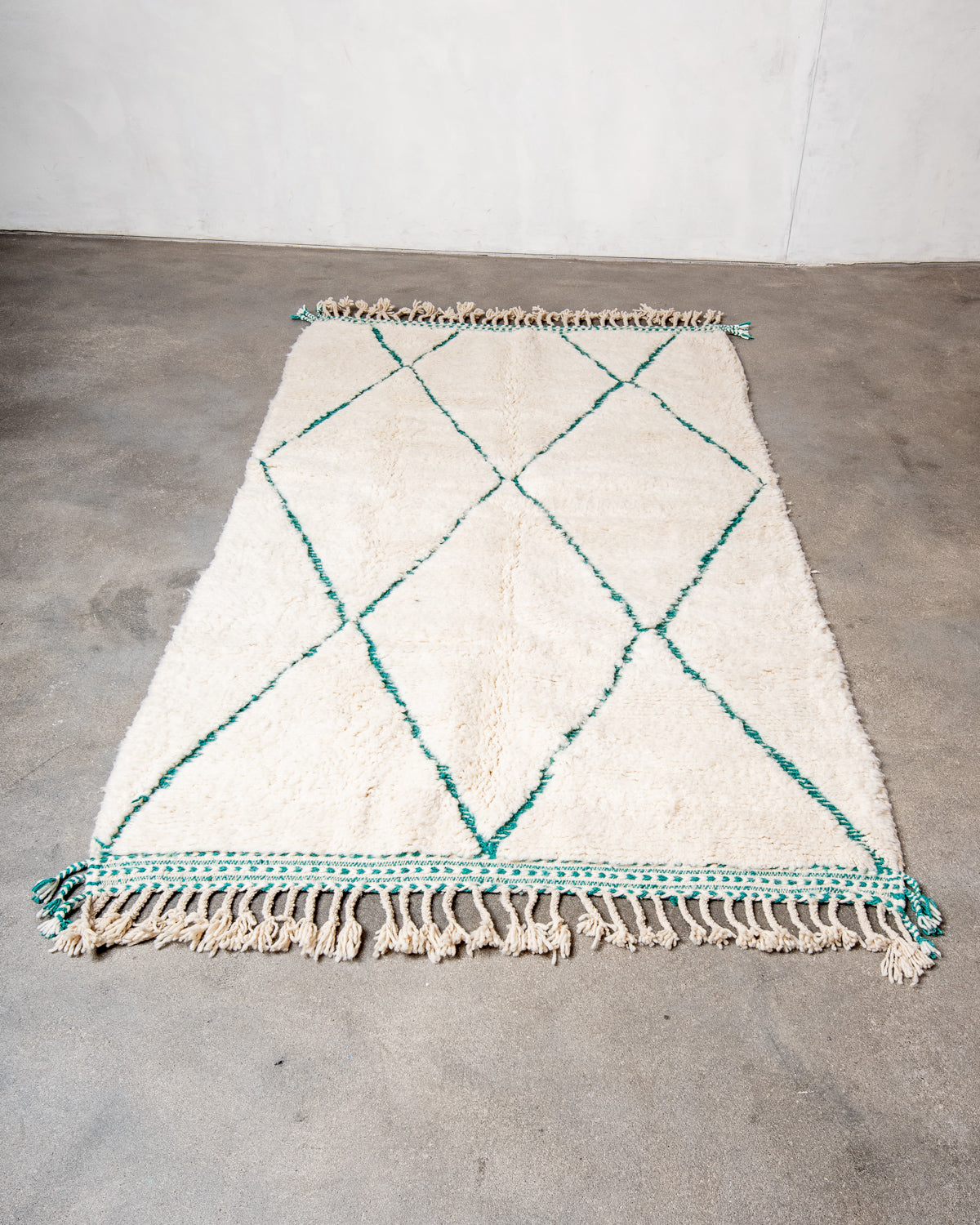 Modern, designer, handcrafted Berber runner rug from Morocco. Beniourain carpet with beautiful colours and patterns and fluffy wool texture.